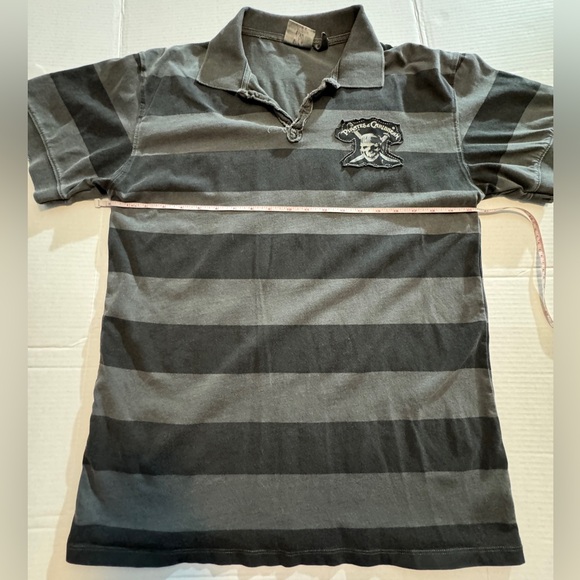 NWOT Men’s distressed Pirates of the Caribbean polo from Disneyland. - Picture 7 of 12
